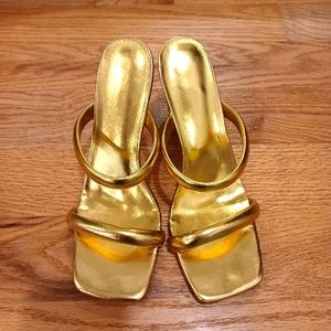 Gold heart heel slip ons